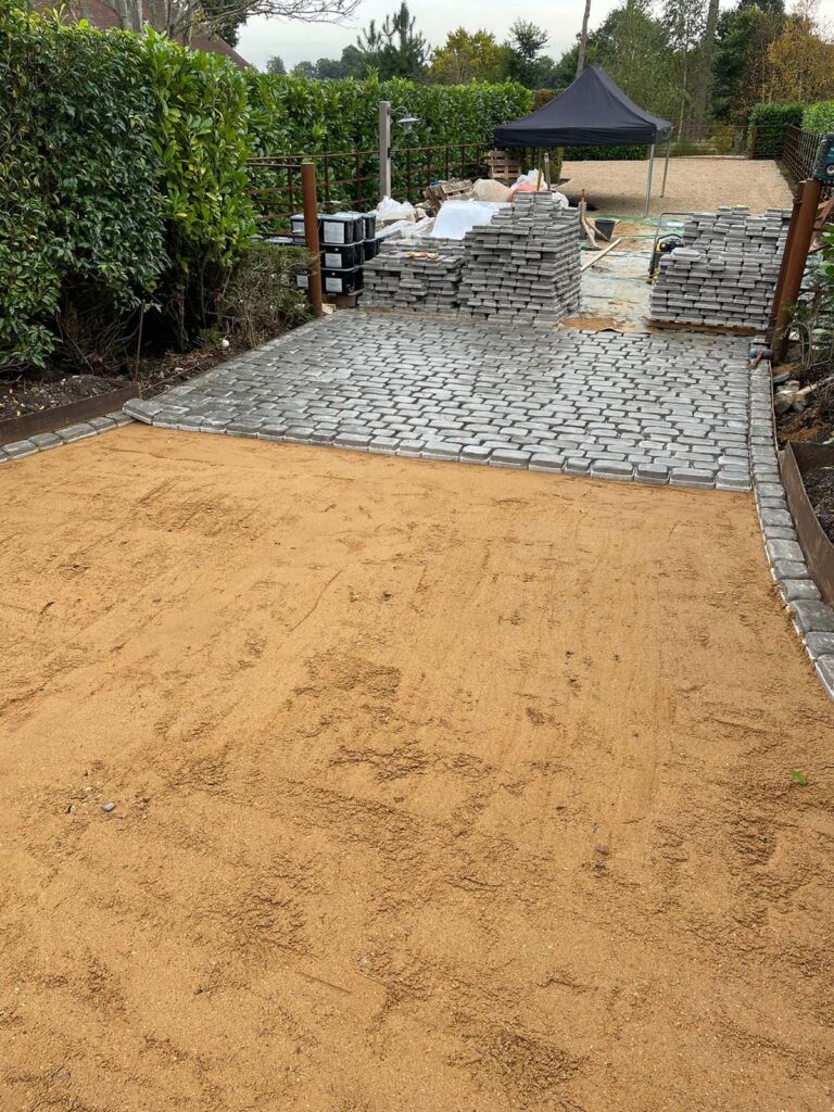 Landscaping cobble sets getting laid